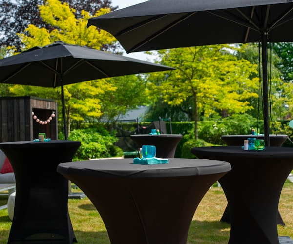 Rows of tables and chairs set up for an event